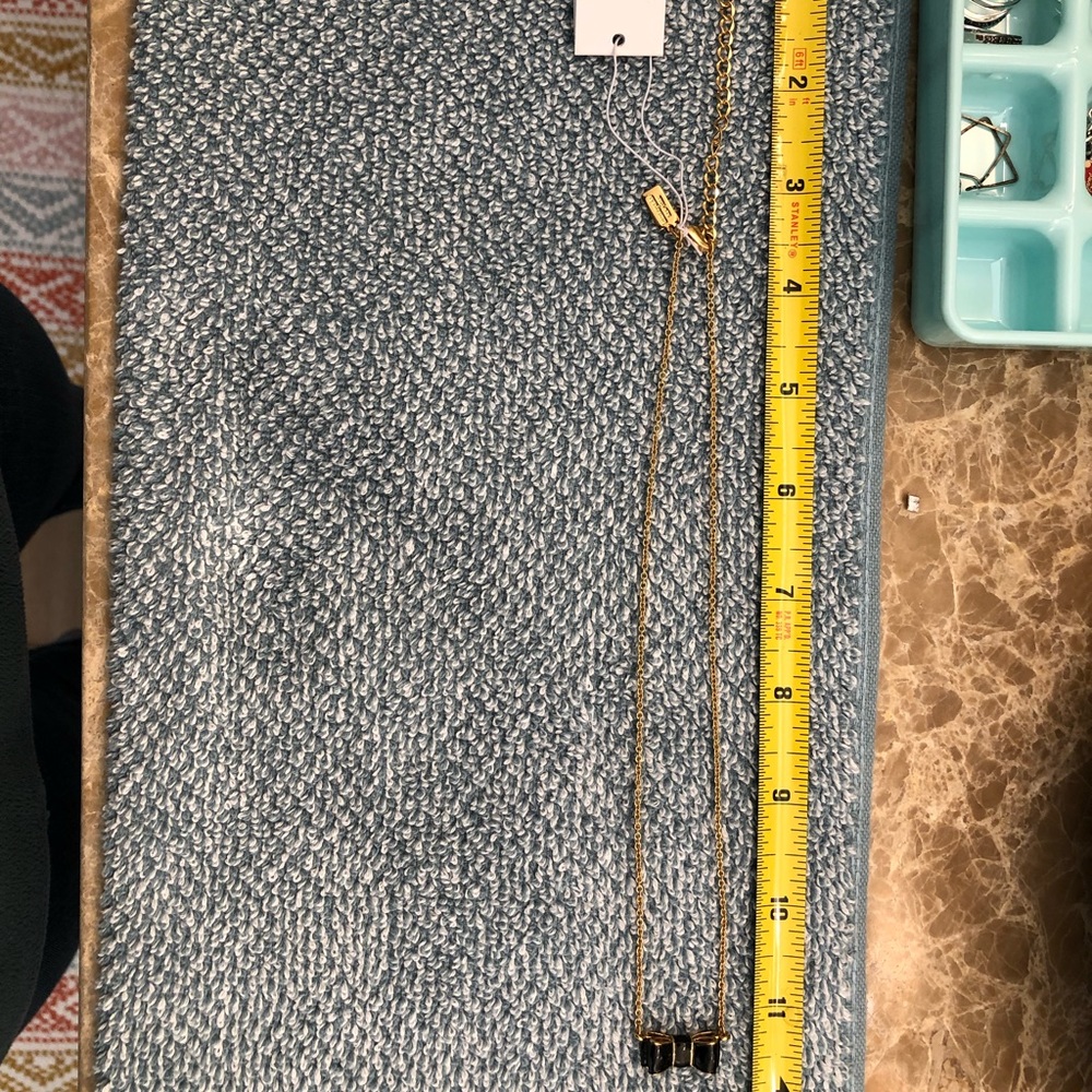 NWT Gold and black bow necklace